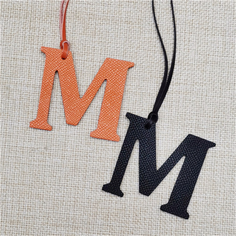 XMESSUN Nowy Angielski Litera  – Monogram Keychain Leather recenzja i cena